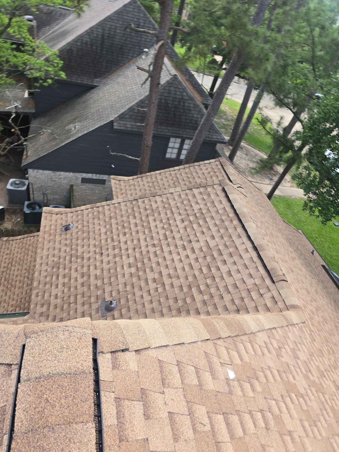 Completed asphalt shingle roof replacement with new pipe boot replacements on a Kingwood, TX home — O&S Roof Repair contractor